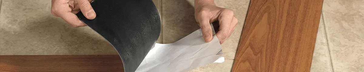 A professional installing vinyl flooring in Chicago, IL